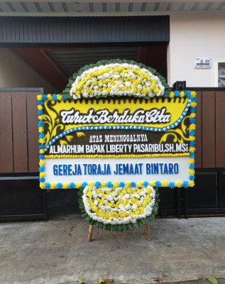 Papan Bunga Duka di Dimba
